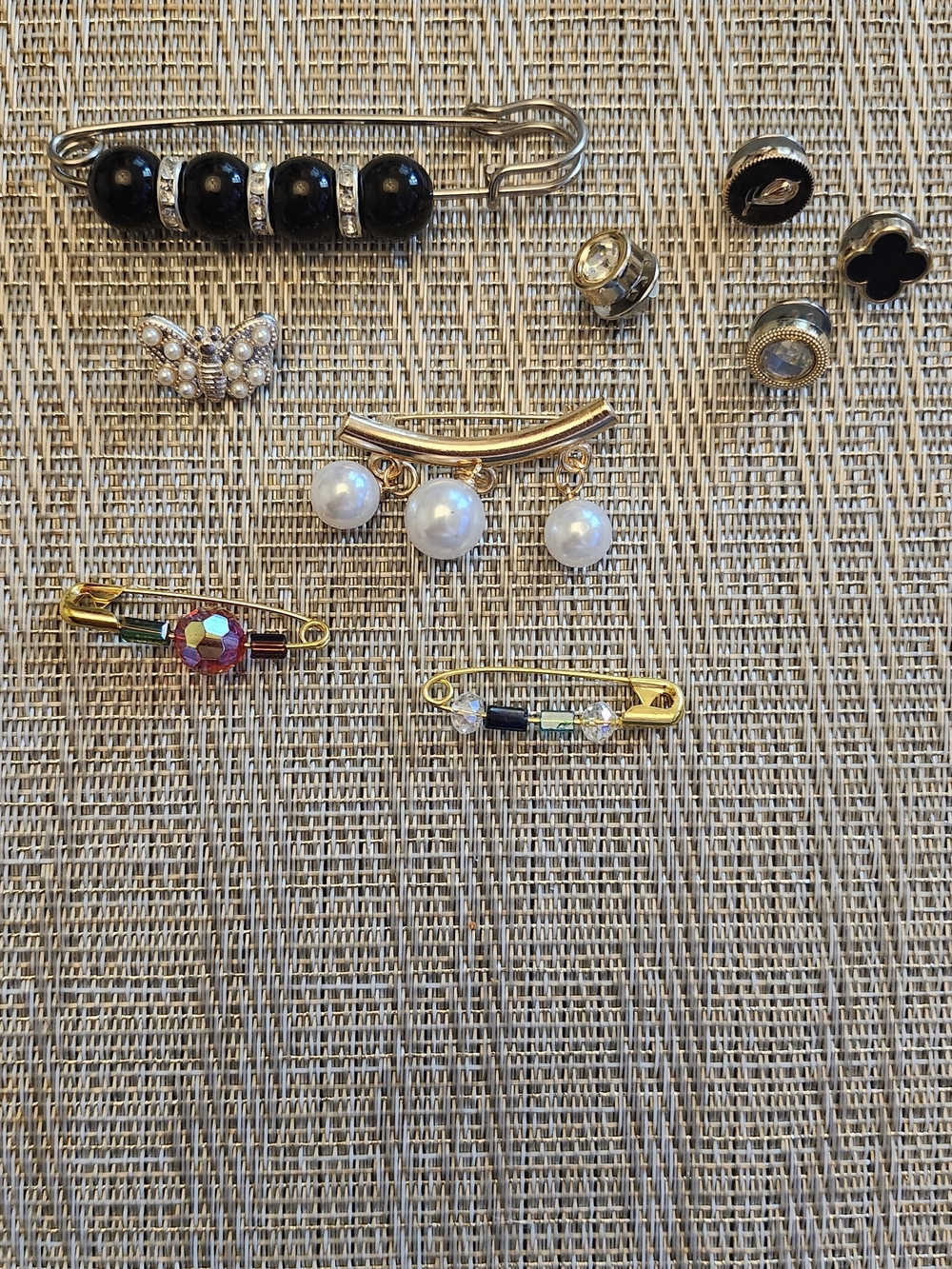 Hand Crafted Gold-tone Brooch Set with Black, White, and Multicolor Accents